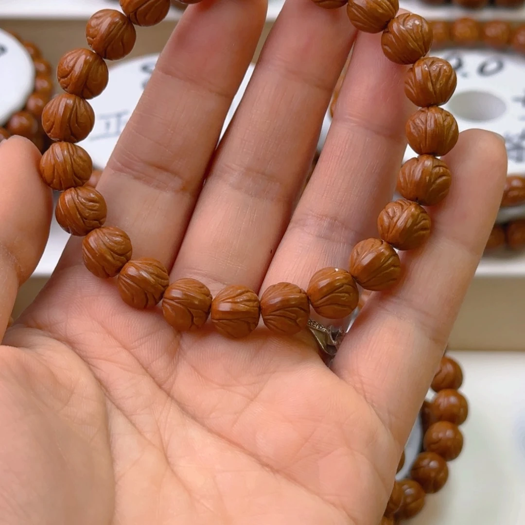 桃核手串扶****）龙纹桃核元宝