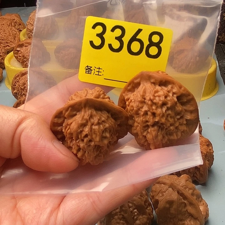 大***强把件文玩核桃紫金山 精对边35