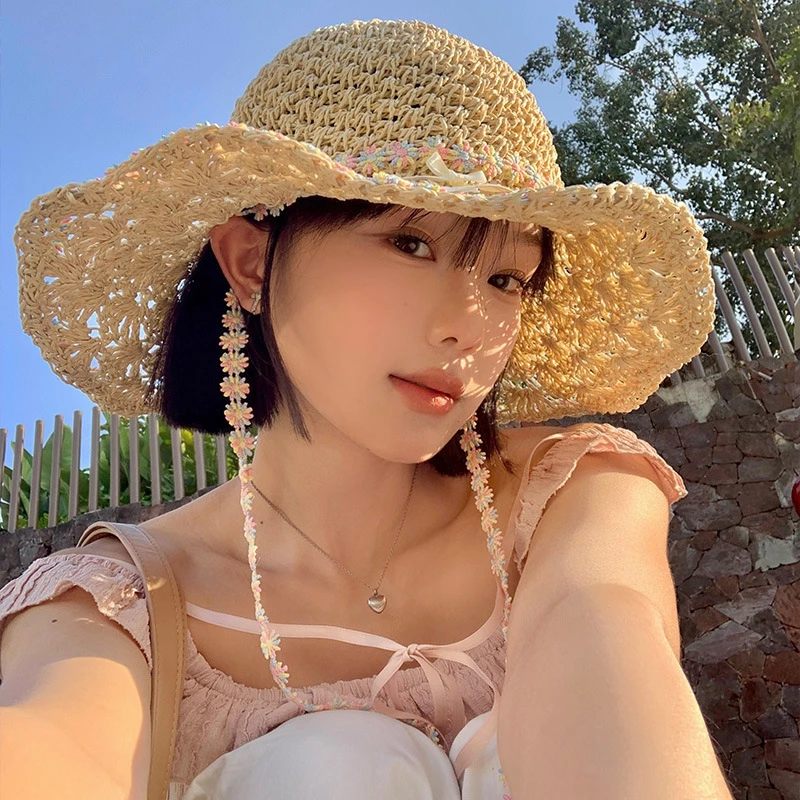 2025新大帽檐花朵绑带草帽夏季度假风海边沙滩太阳帽子编织遮阳帽