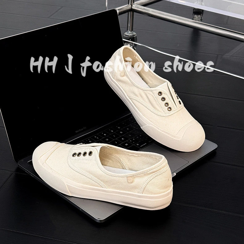 夏季透气帆布鞋女2025新款小白鞋浅口一脚蹬女松紧百搭无鞋带板鞋