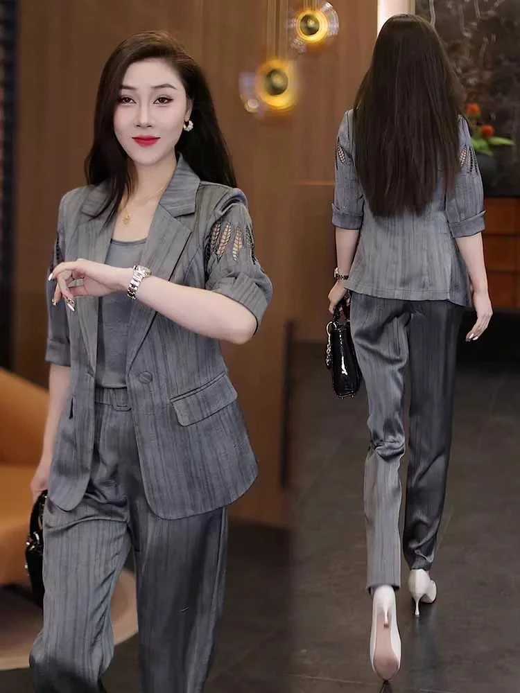 时尚西装套装女2025春夏新款洋气质减龄镂空外套背心直筒裤三件套