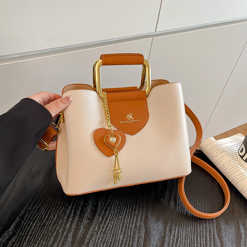 通勤风常规流苏单肩手提包小众薄雾少女风单肩包