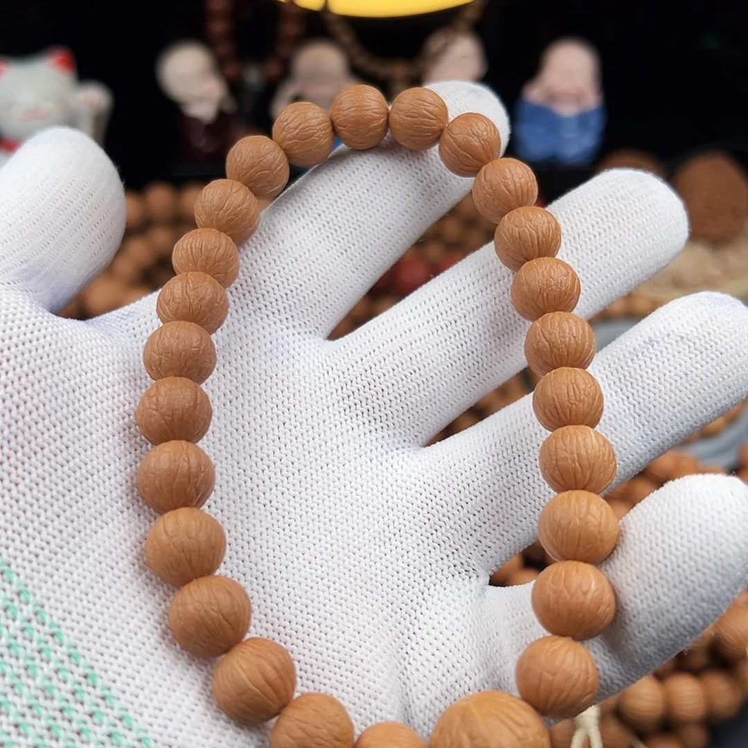 N***一手串猴头核桃凤羽