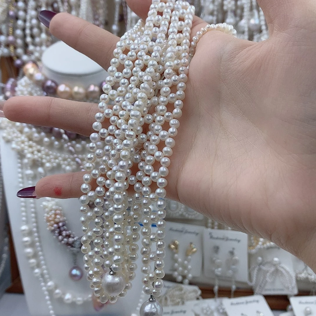 D***o耳饰银S925镶嵌淡水珍珠