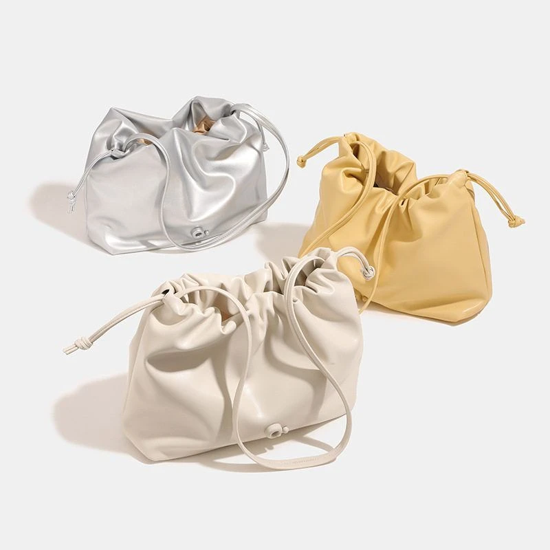 高颜值ins风单肩女包2025春夏新款抽绳束口水桶包时尚简约斜挎包