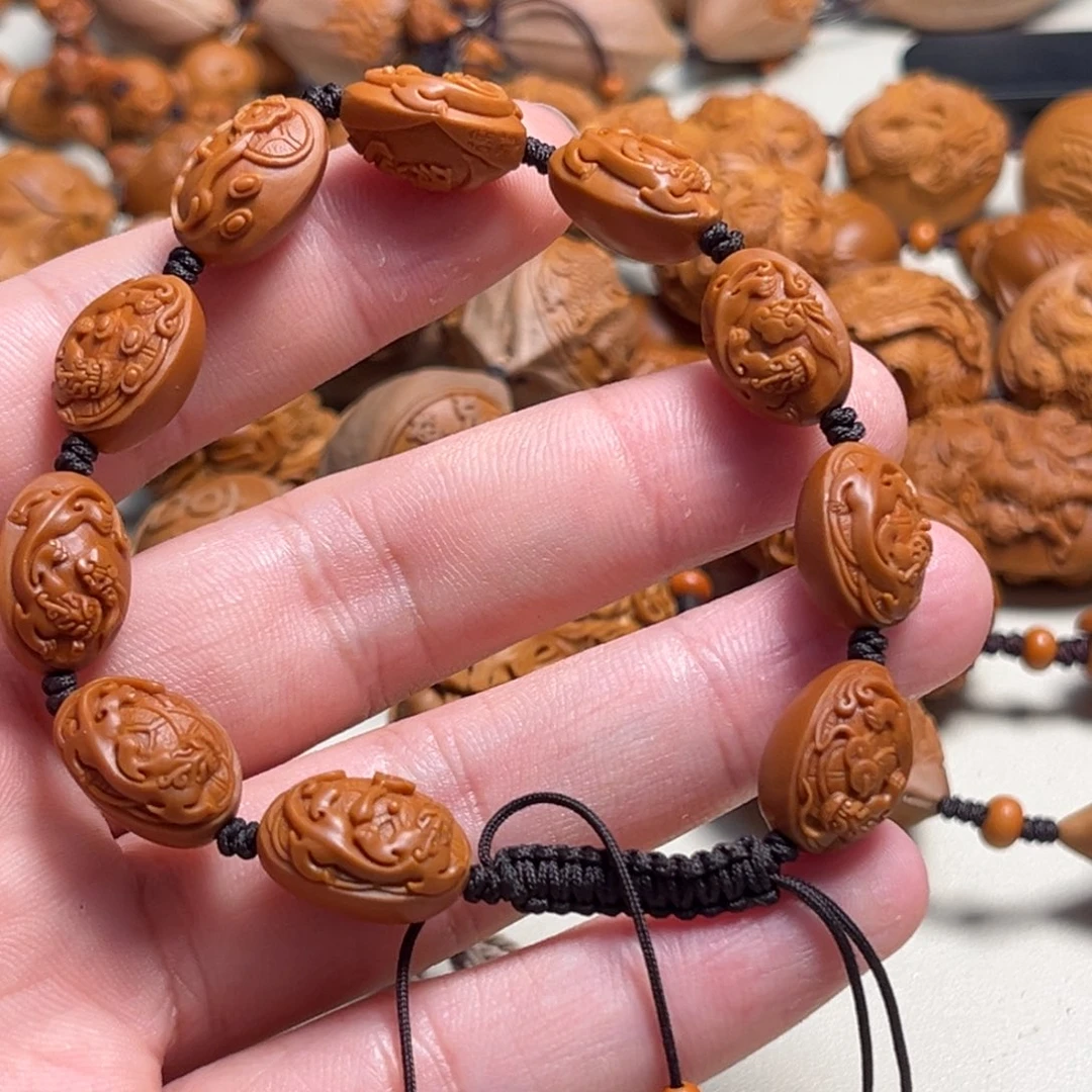 橄榄核吊坠2**3螭龙手串