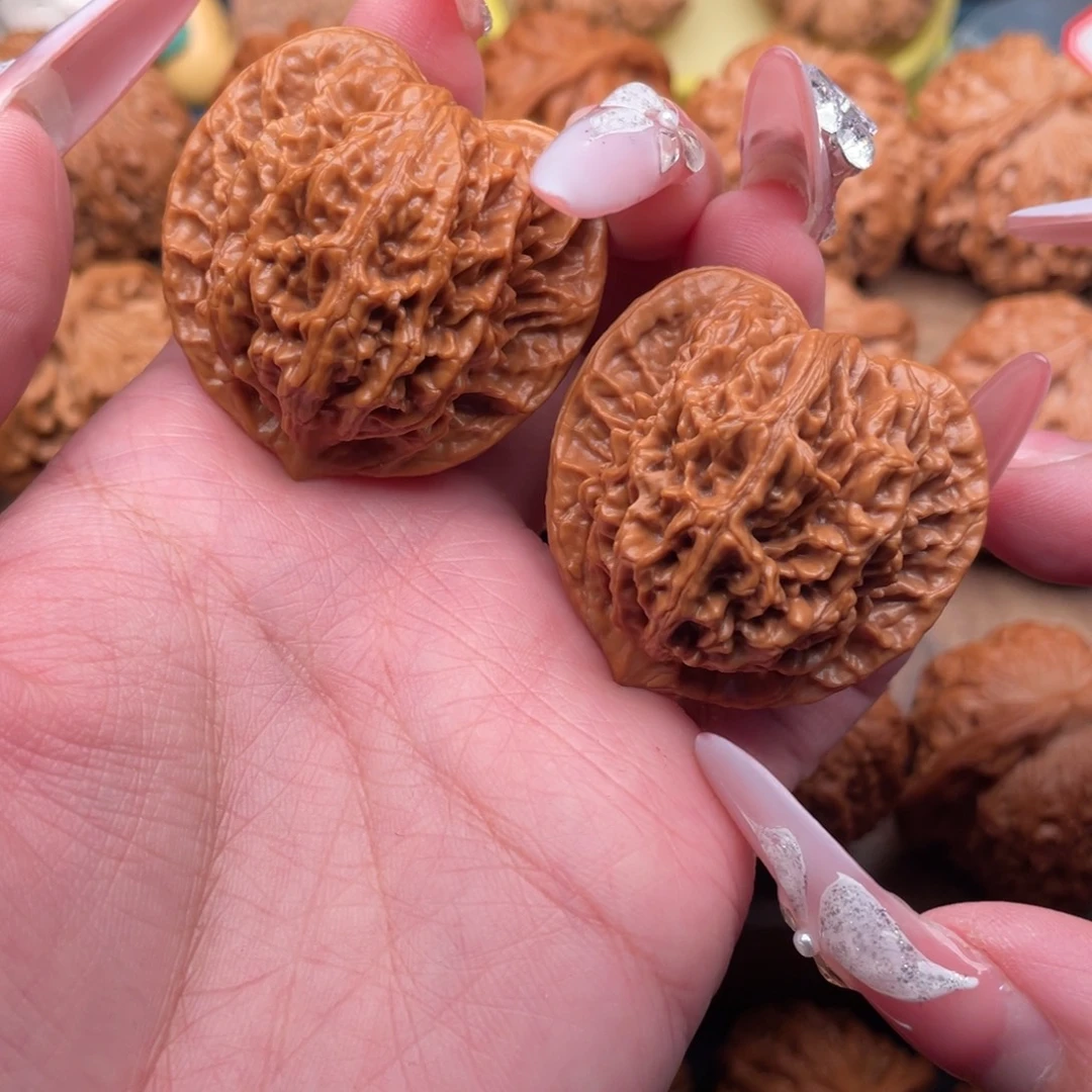 文玩核桃把件全品，桃心盘龙纹狮子头40