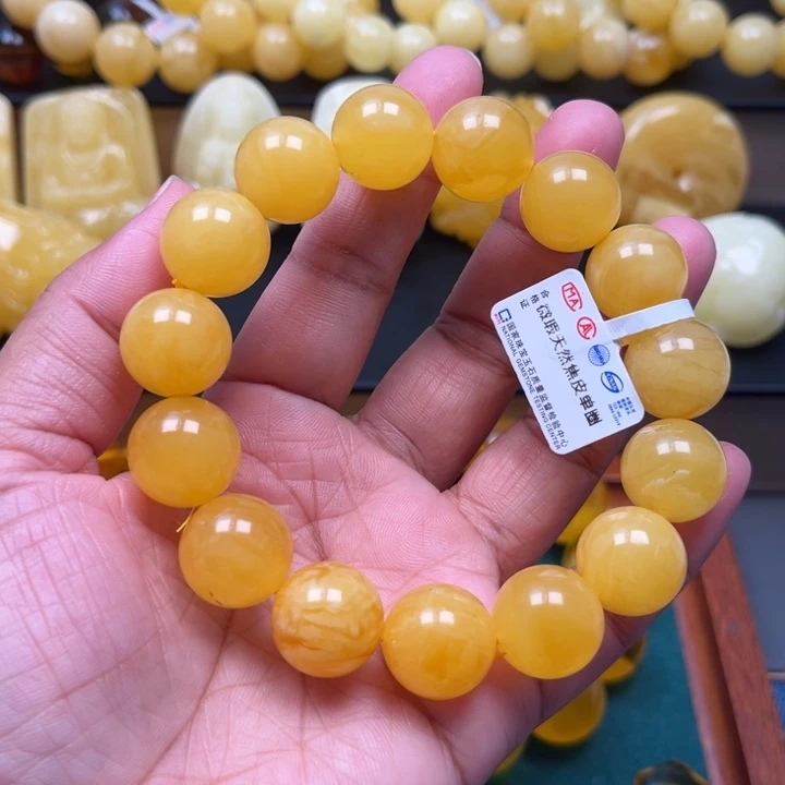 琥珀未镶嵌珠宝奇石M132号15+鸡油红妖花微瑕