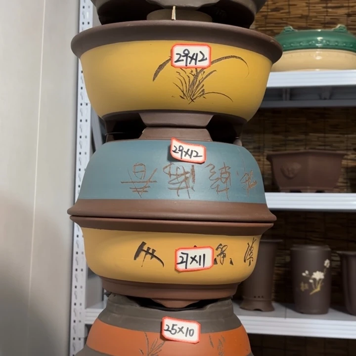 紫砂花盆100-6。