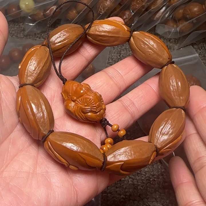 冷***生橄榄核吊坠包衣无相佛