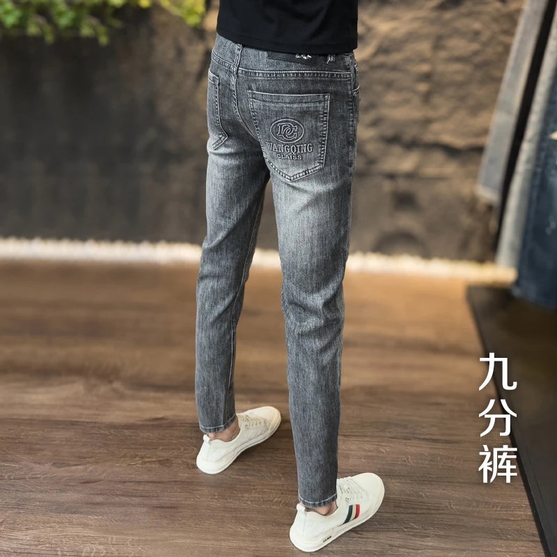 春夏季薄款潮流牛仔裤欧货男士印花时尚修身弹力百搭小脚九分裤子