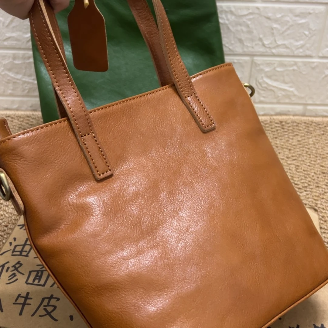 焦。头层牛皮真皮包包