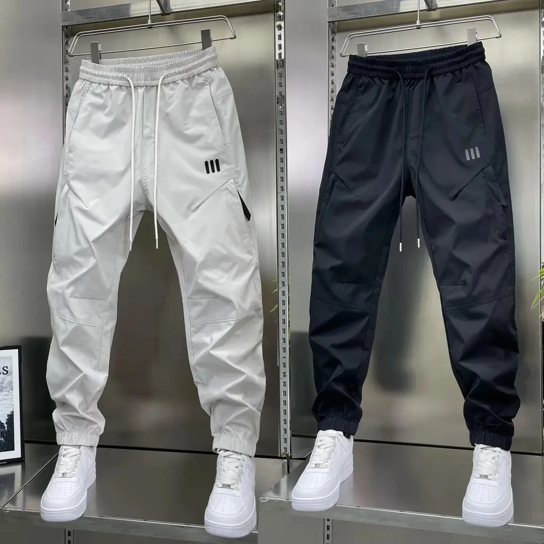 今年流行轻奢痞帅束腿裤秋季薄款休闲裤子运动束脚裤男士时尚百搭