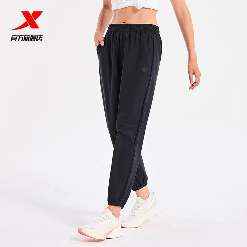 特步运动裤女健身弹力休闲裤秋季新款束脚百搭女子梭织长裤