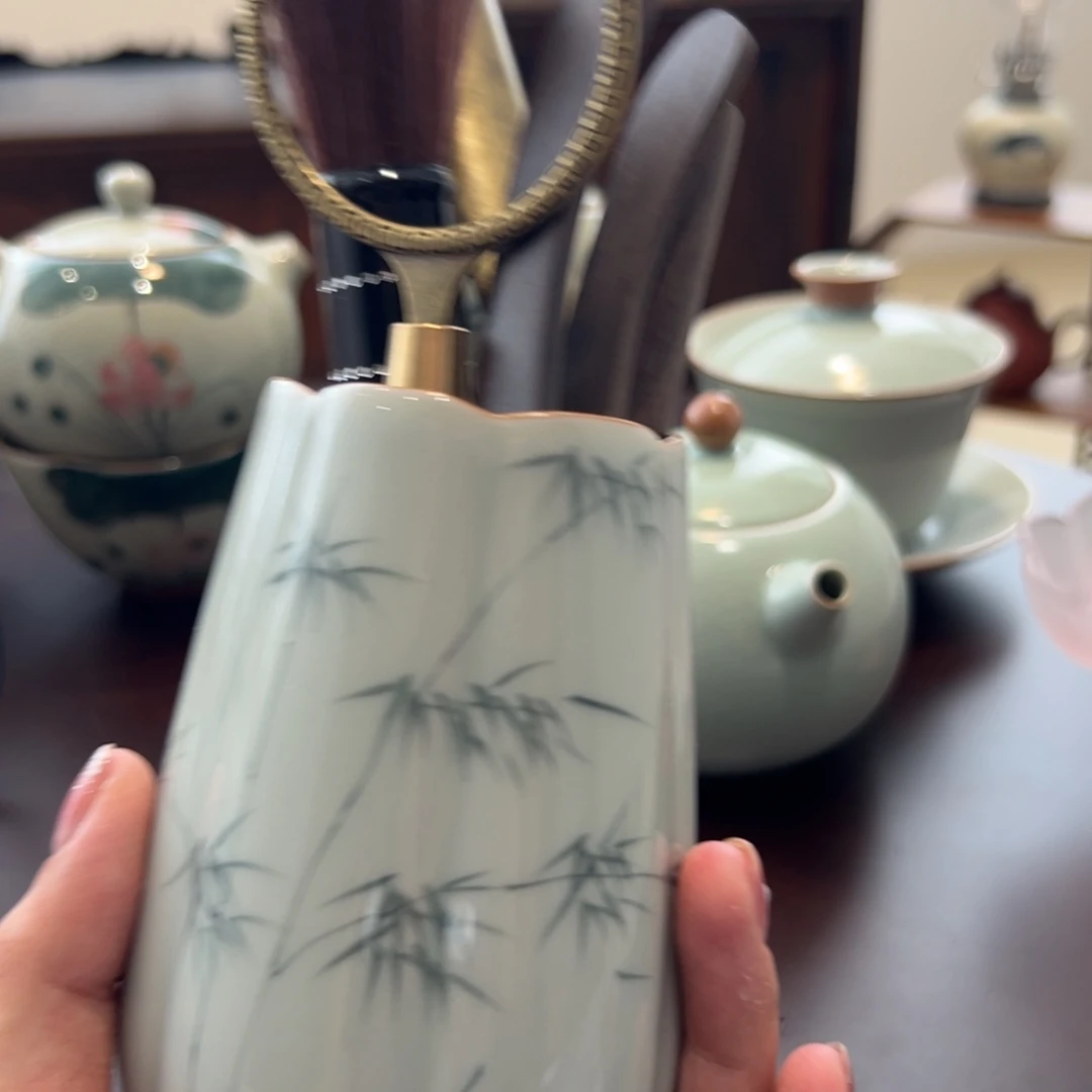 茶具等产品的生产和销售为一体的