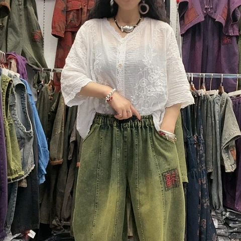 刺绣招财猫牛仔福字裤绿