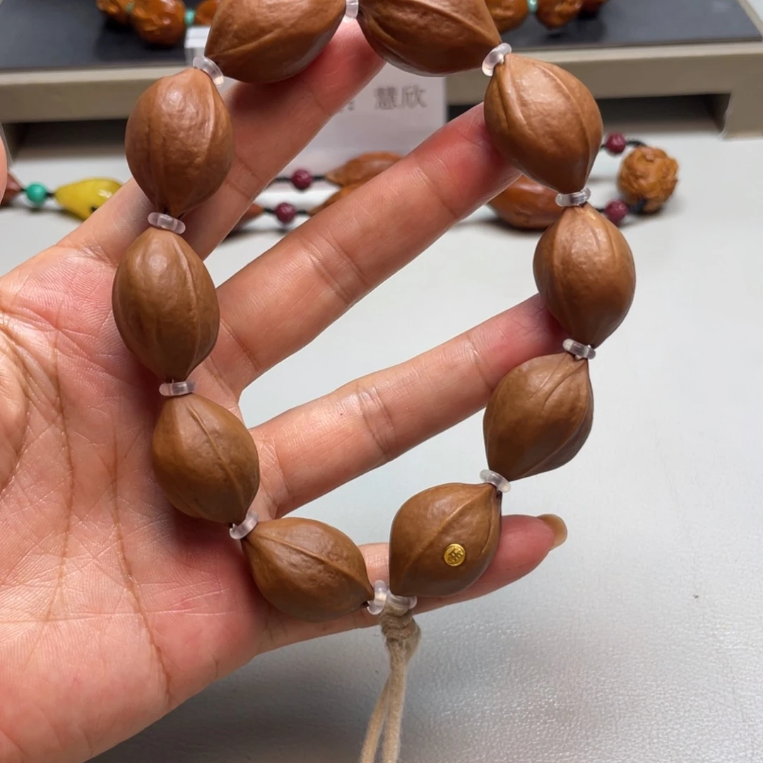 吊坠橄榄核金标铁素