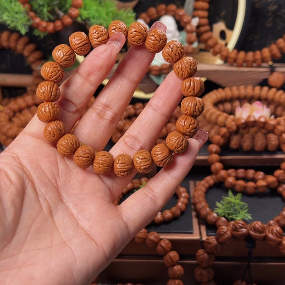 桃核手串13野生龙纹凤羽