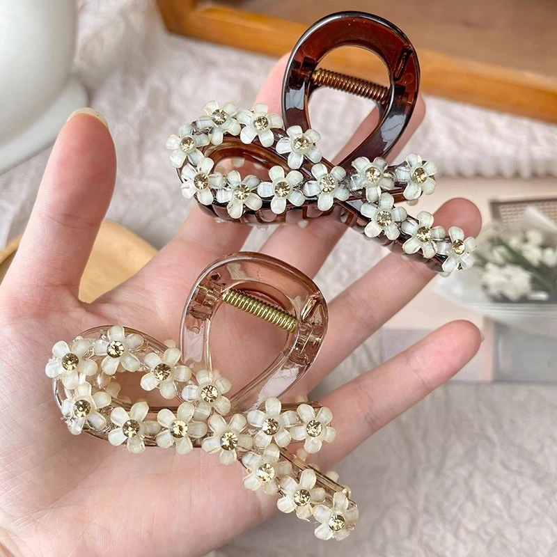 轻奢水钻花朵抓夹气质蝴蝶结发夹韩版后脑勺盘发鲨鱼夹发量少头饰