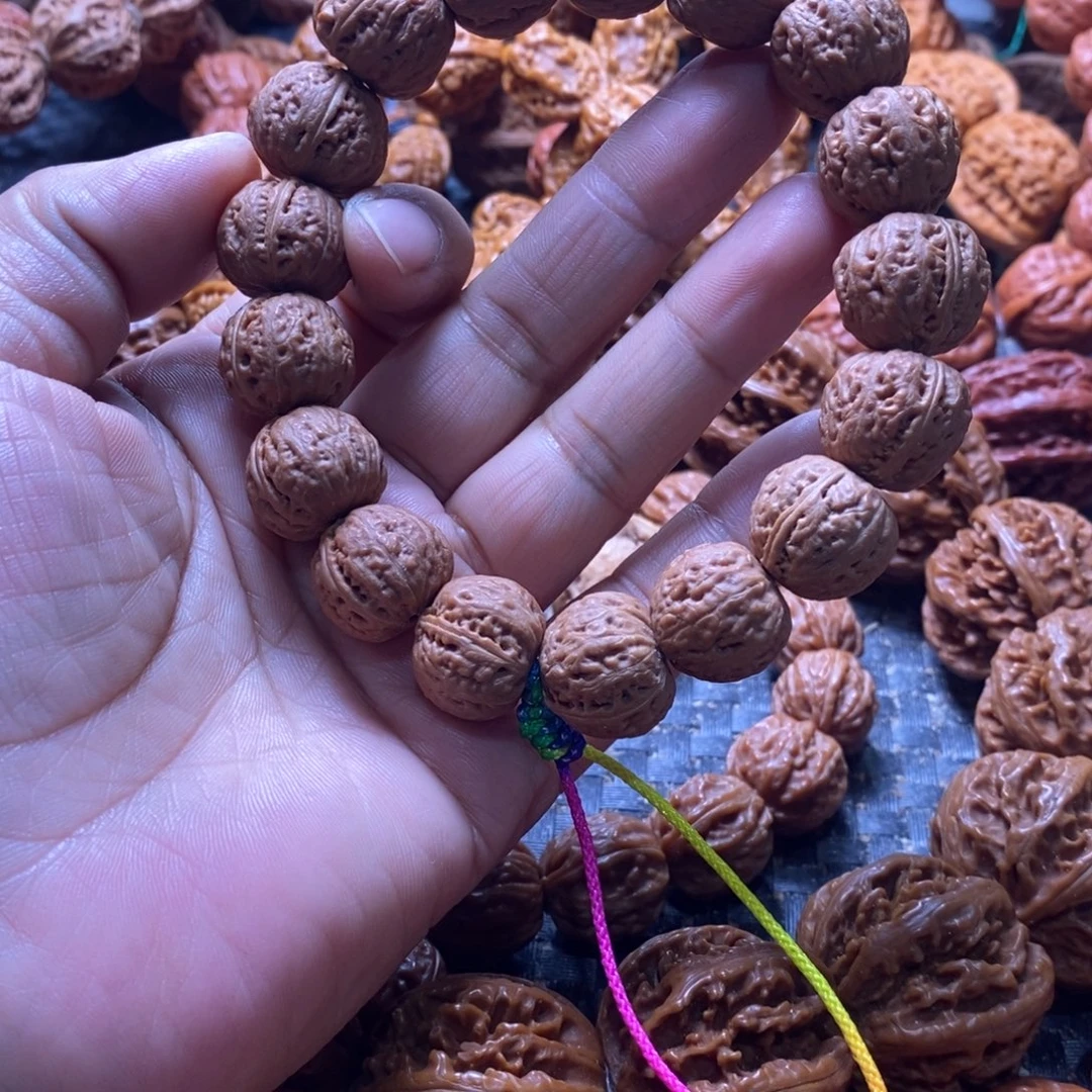 惷***閖文玩核桃吊坠磨盘