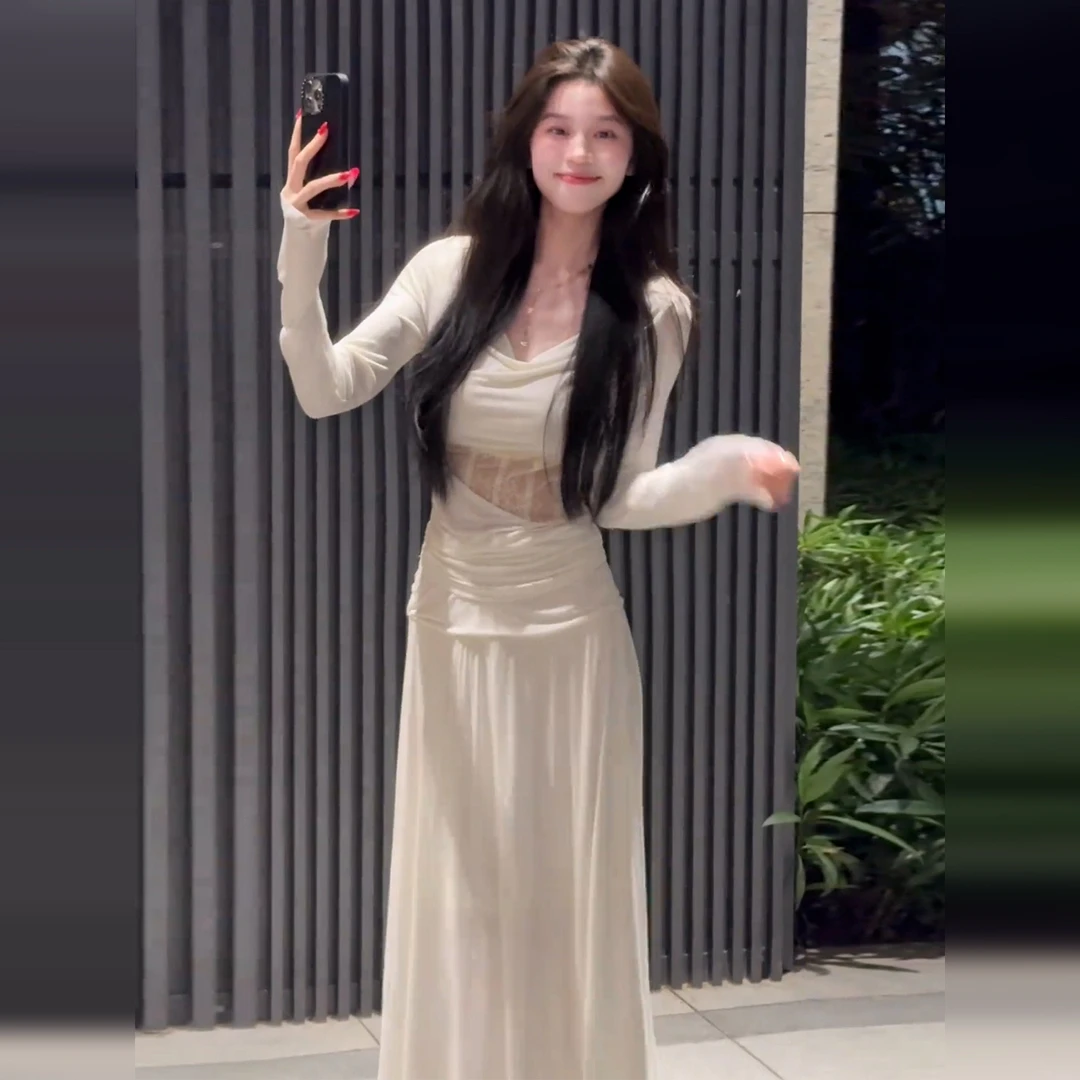 法式纯欲斜肩镂空连衣裙子女2025新款早秋设计感收腰显瘦包臀长裙