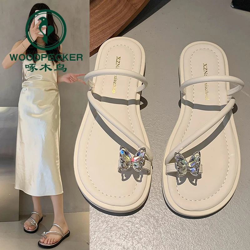 啄木鸟平底拖鞋女2024夏季新款外穿网红百搭时尚配裙子套趾一字拖