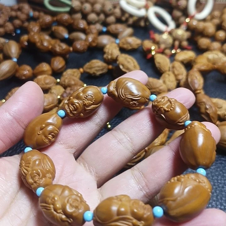 陳***龍橄榄核吊坠橄榄核手串手持