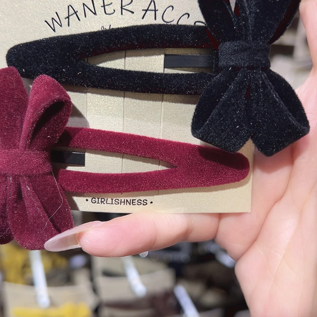 皮质铁合金蝴蝶结拼色掰掰夹