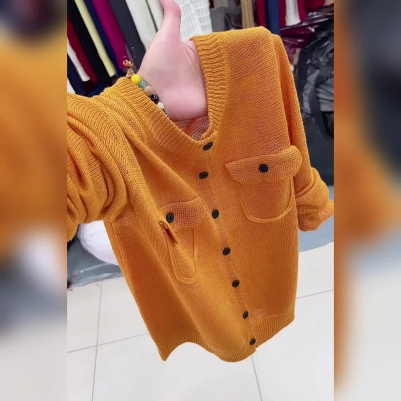 韩版洋气高级单排扣橙色上衣长袖开衫2025早秋新款时髦慵懒风显瘦