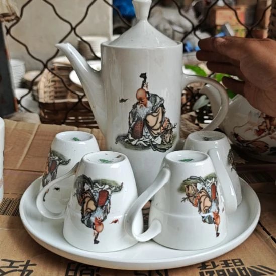 库存微瑕老寿星多孔茶壶一套