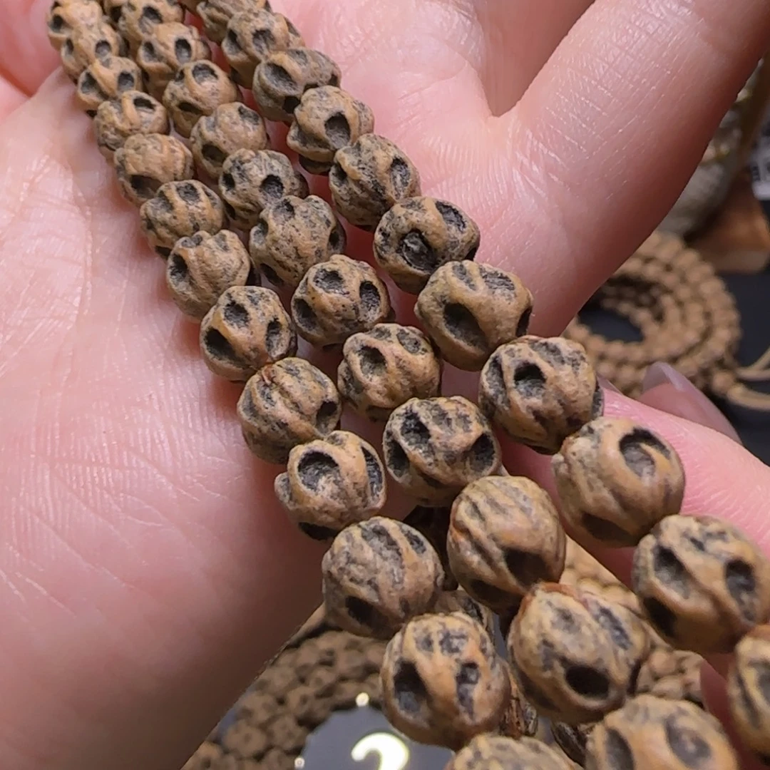 啡***柏香籽/百香籽吊坠