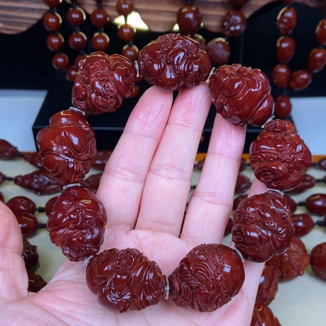 乐***悠橄榄核吊坠八宝弥勒