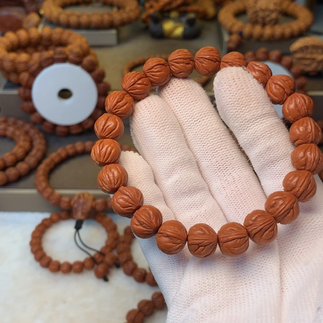 *****桃核手串秦岭龙纹