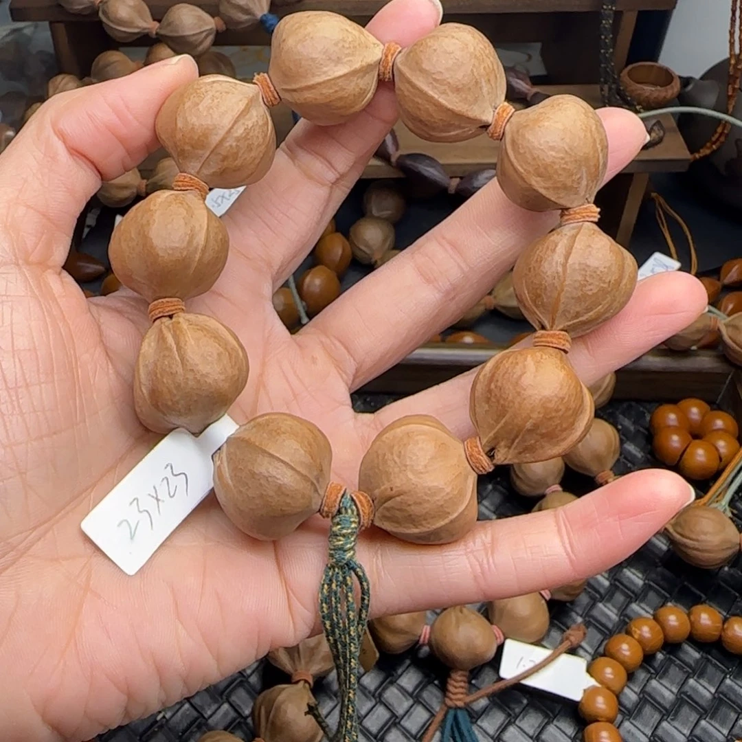 手串橄榄核13。2.3*2.3梅林铁