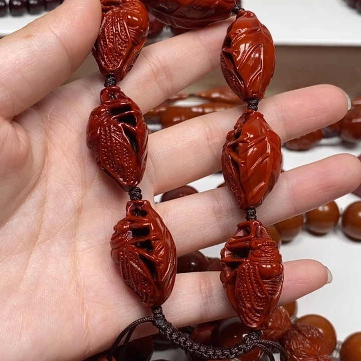 亚***辉橄榄核雕刻工艺的发展