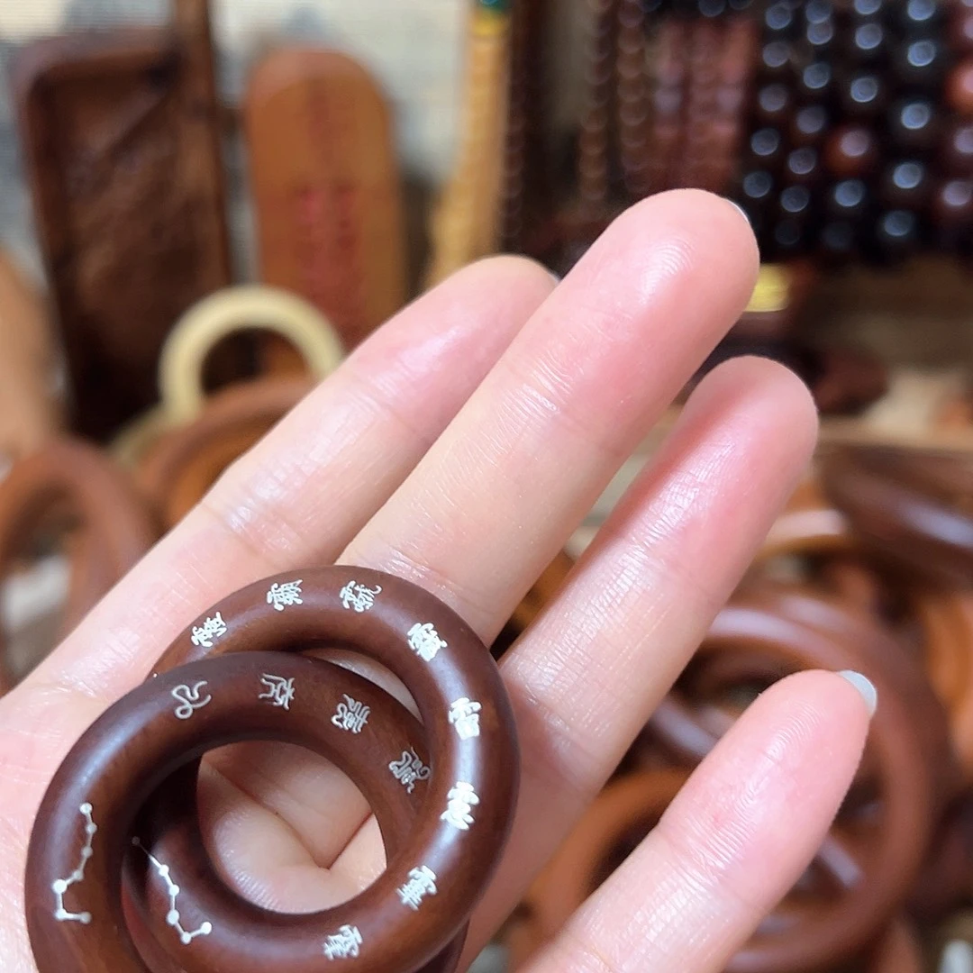 源***然2.5内径枣木老料镶银乾坤圈