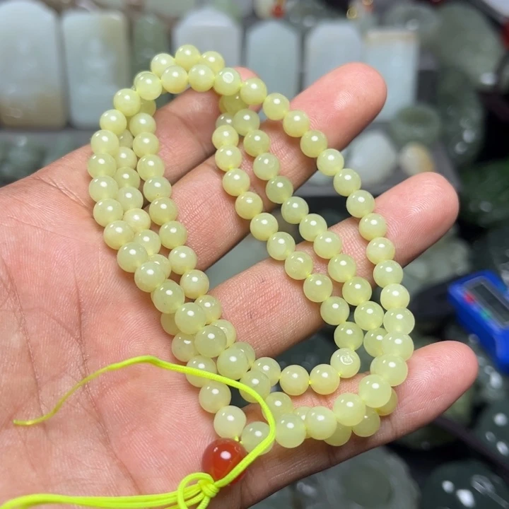 和田玉未镶嵌挂件万****人