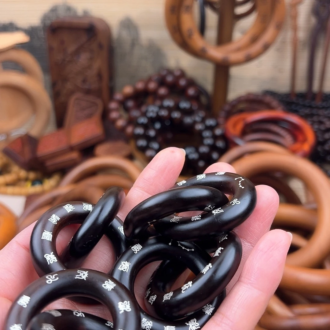 顺***子2.5内径枣木玉化镶银4个