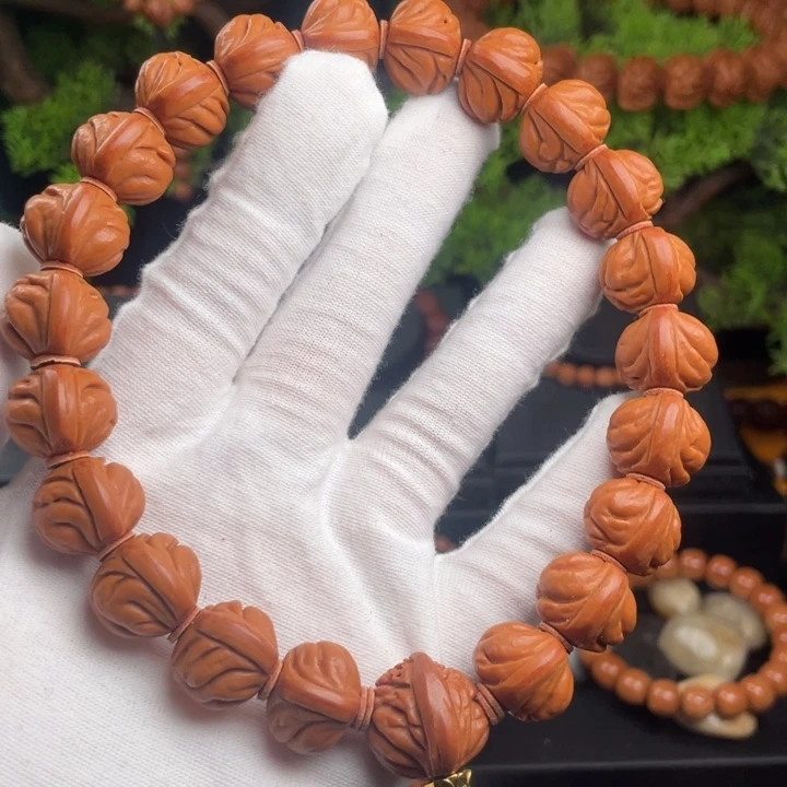 用***5吊坠桃核精品手持