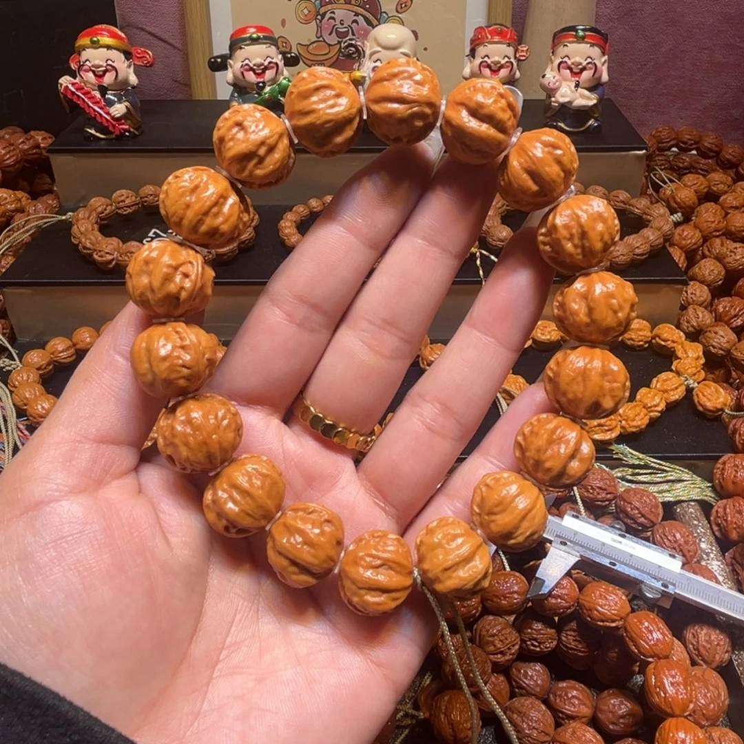 阳***）手串文玩核桃精品