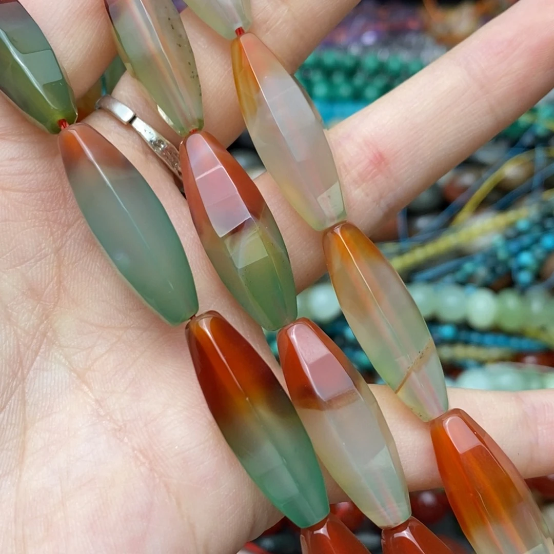 玛瑙/玉髓未镶嵌珠宝半成品孔雀玛瑙橄榄珠约11*29mm一条