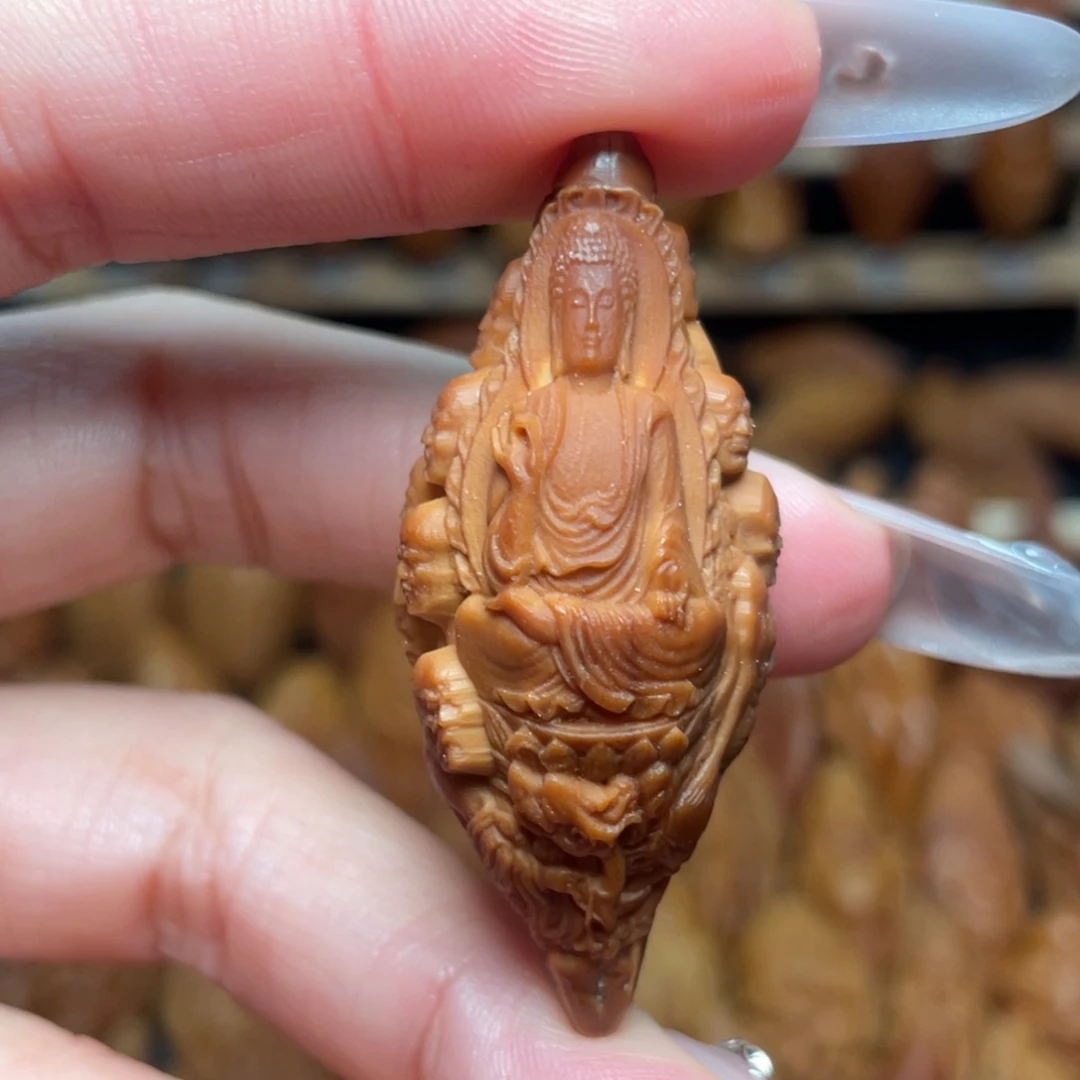 橄榄核把件十八罗汉拜如来