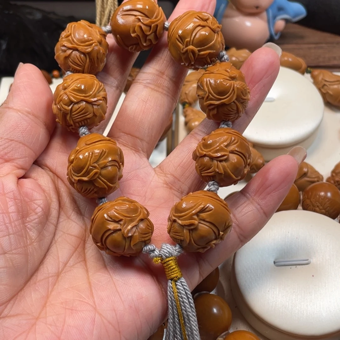 小***人正圆财神橄榄核手串