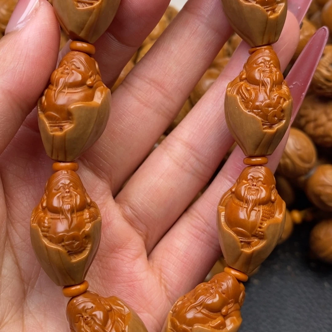 橄榄核手串包衣财神