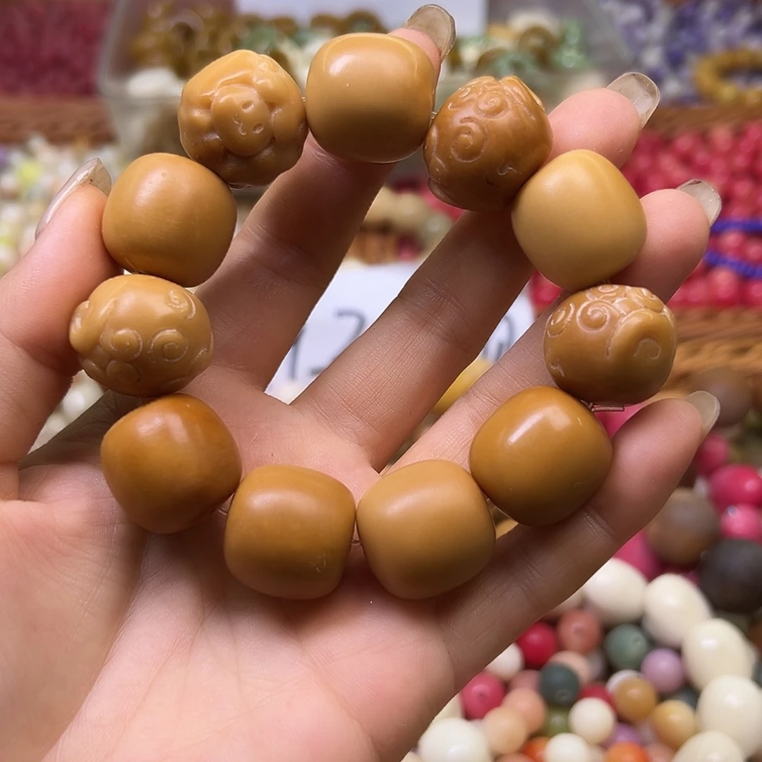 菩提根/象牙果手串瑕疵咖色混串1条有裂有缺肉