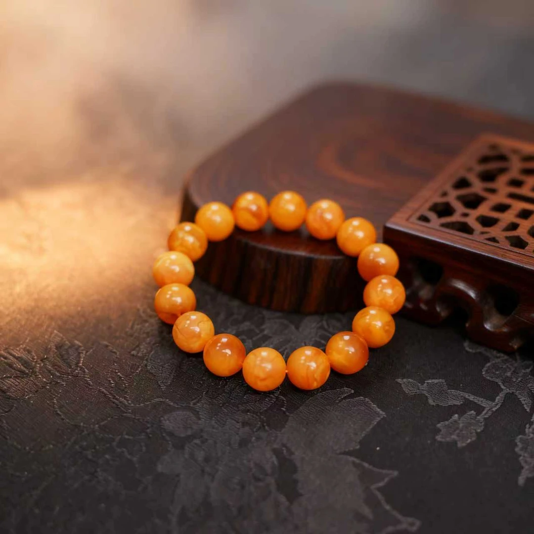 12mm+琥珀蜜蜡 溶洞蜜油性超高*原石男女通用送礼圆珠单圈手串