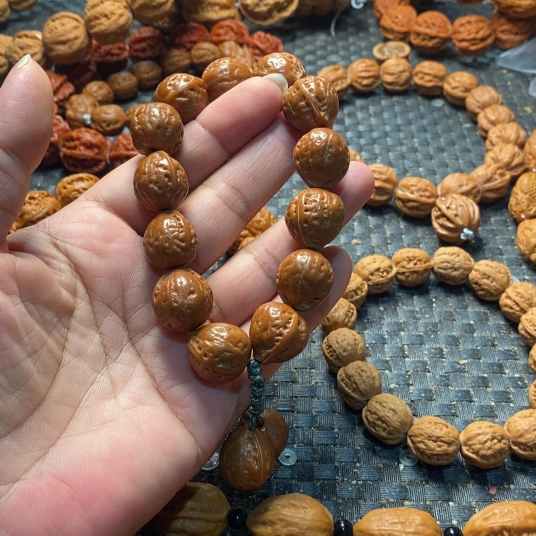 小***一文玩核桃吊坠金豆子