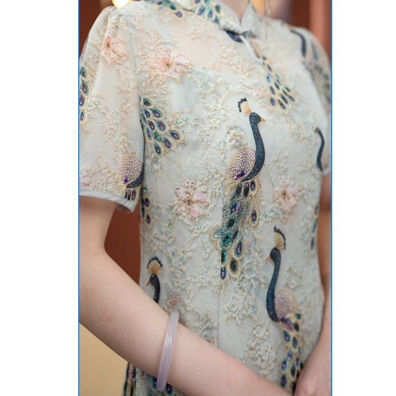 0412新中式改良旗袍连衣裙女2025夏季新款优雅气质减龄孔雀裙子