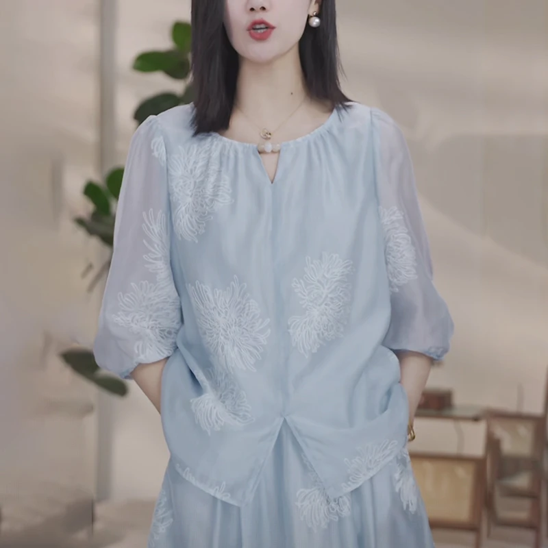 蓝色提花雪纺衬衫女夏季2025新款宽松时尚减龄显瘦设计感中袖上衣