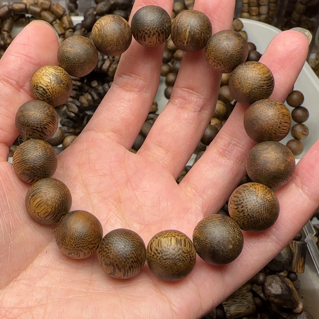 沉香手串q****g单圈1.3规格圆珠14.3克老料乌身